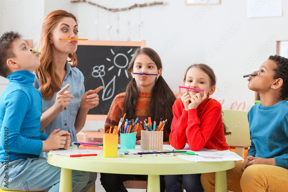 Drawing teacher giving classes at school