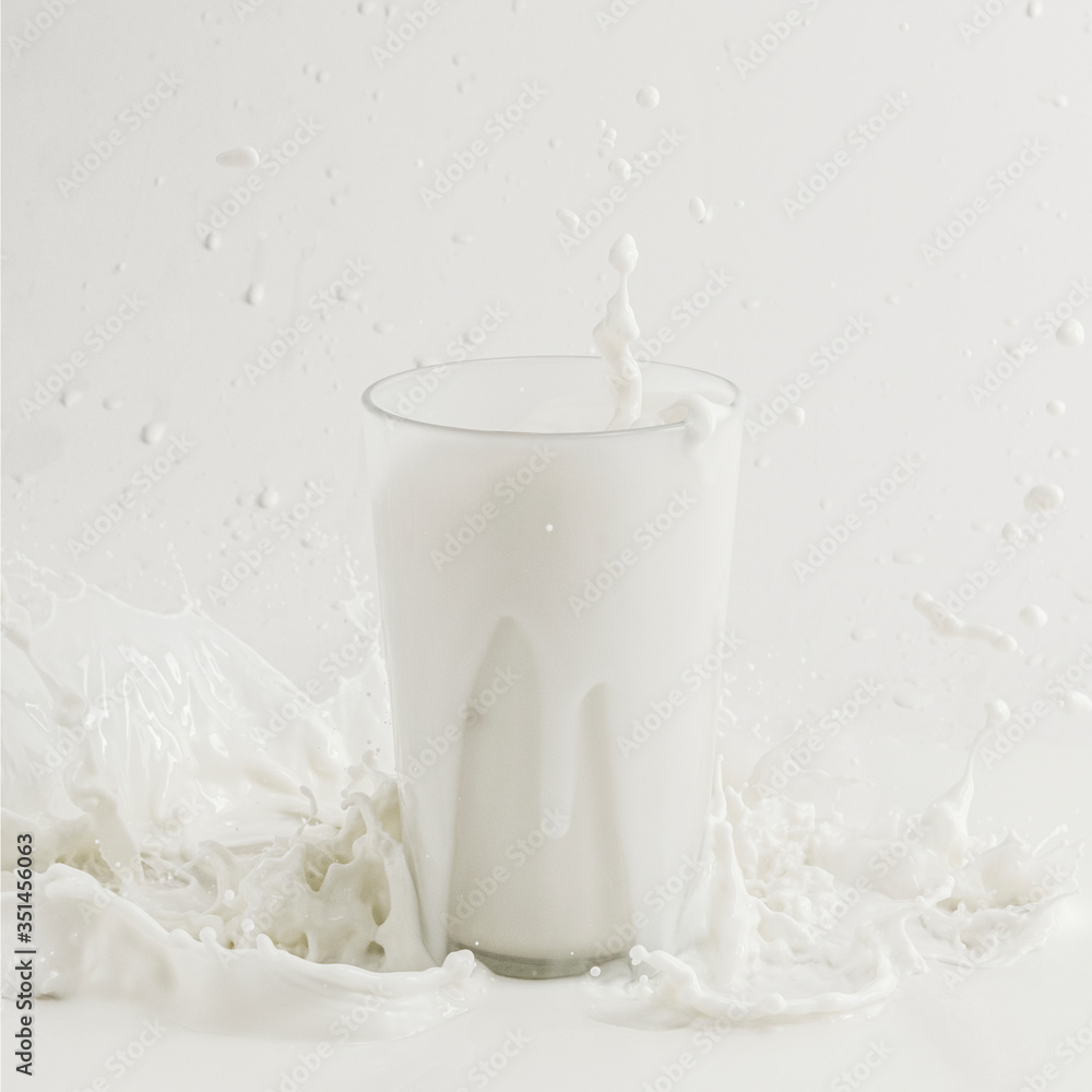 Fresh milk splashing from a glass