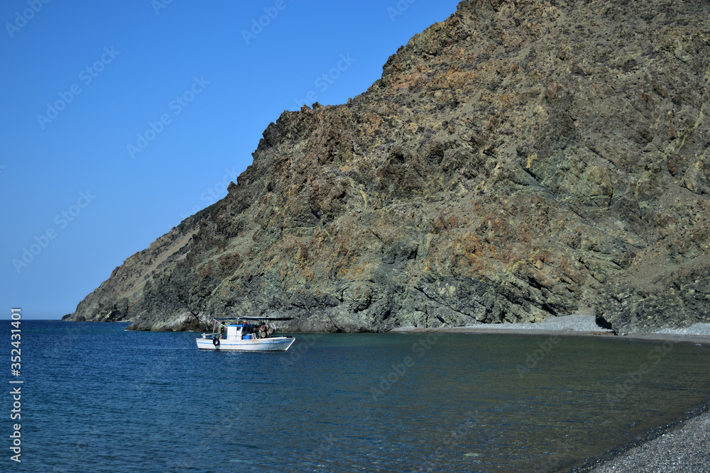 fishing boat at the coast of the sea - Kipos beach, Samothraki island, Greece, Aegean sea