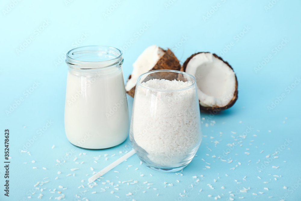 Tasty coconut milk on color background