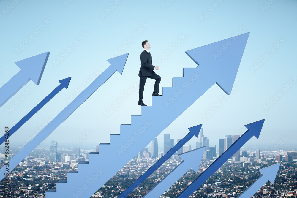 Businessman climbs stairs in form blue arrow