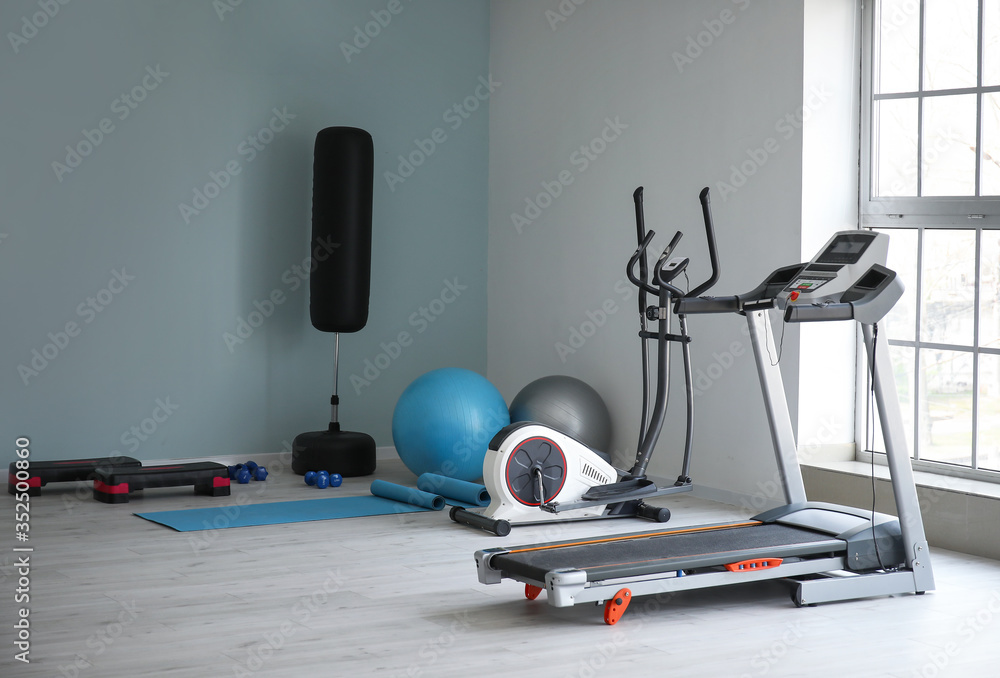 Interior of gym with modern equipment