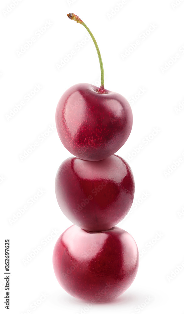 Isolated stack of cherries. Pyramid of three fresh cherries on top of each other isolated on white b