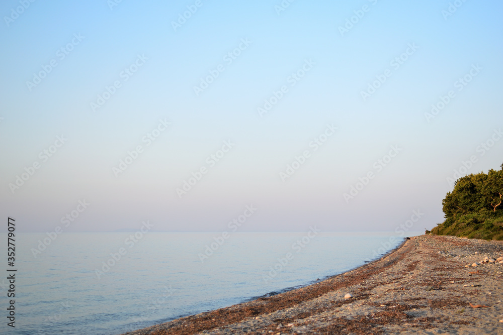 Cloudy sunset over the sea at Therma beach – Samothraki island, Greece, Aegean sea