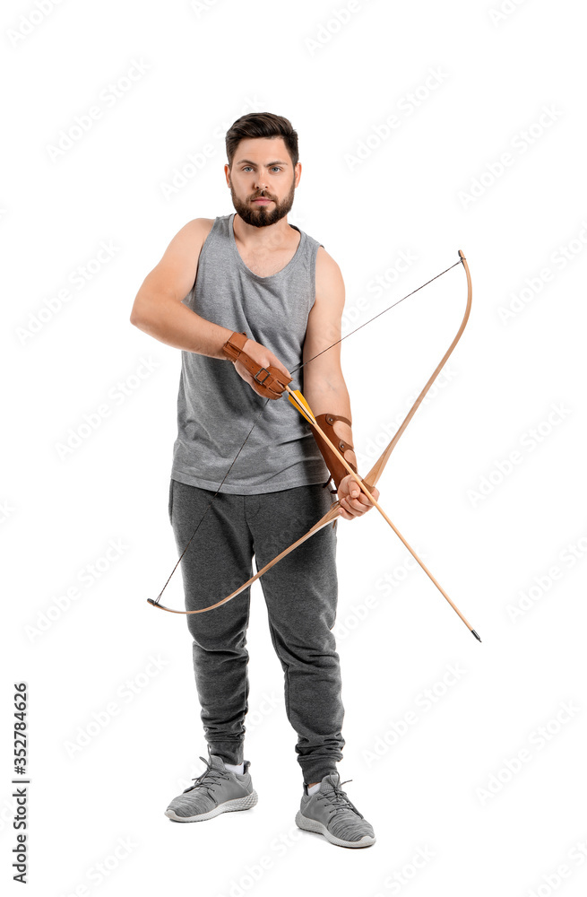 Handsome man with crossbow on white background