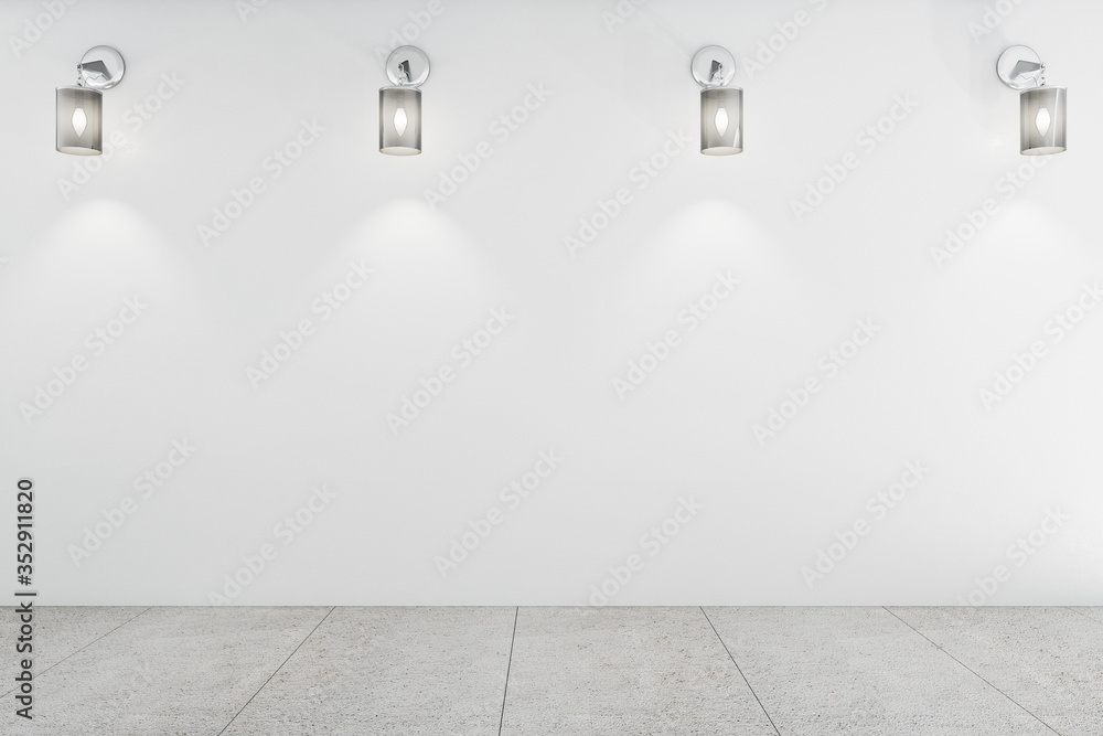 White exhibition hall interior and blank concrete wall.