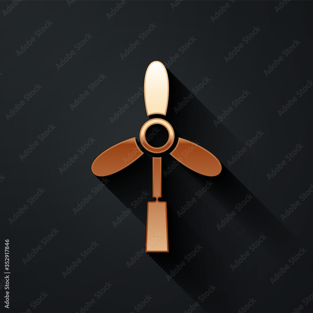 Gold Wind turbine icon isolated on black background. Wind generator sign. Windmill for electric powe