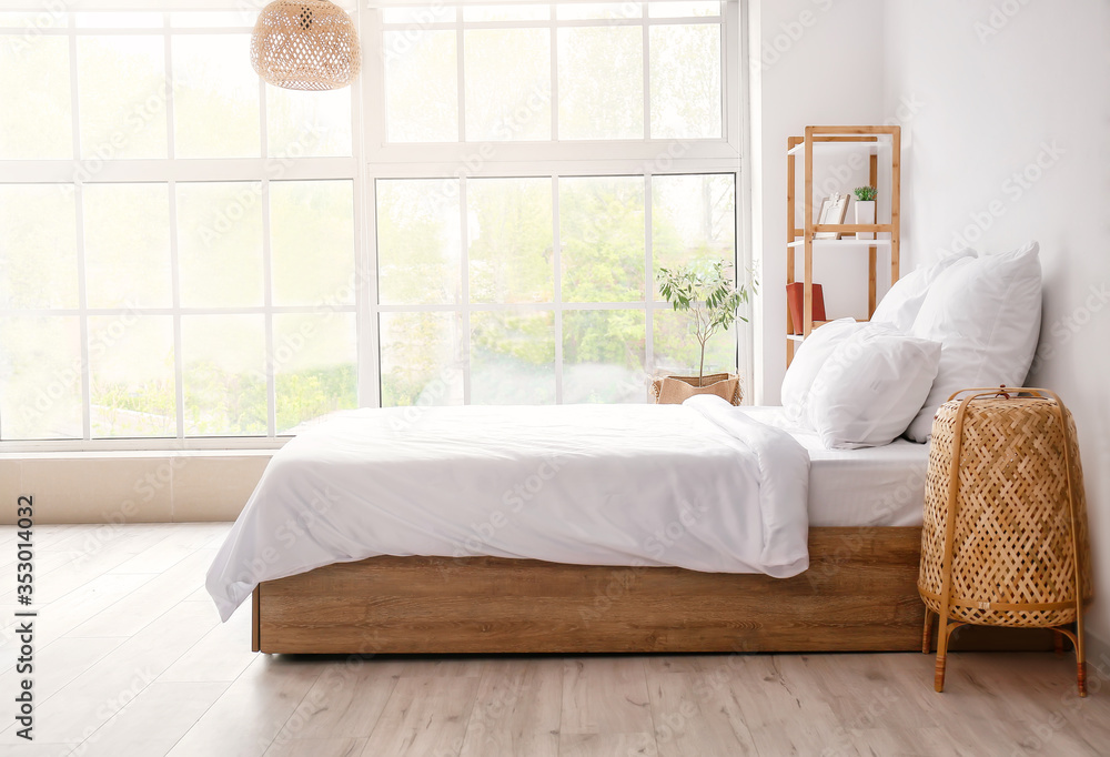 Interior of comfortable modern bedroom