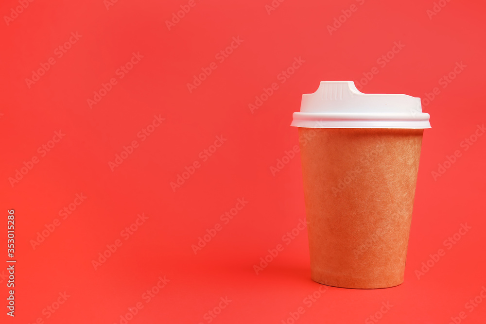 Takeaway cup for drink on color background