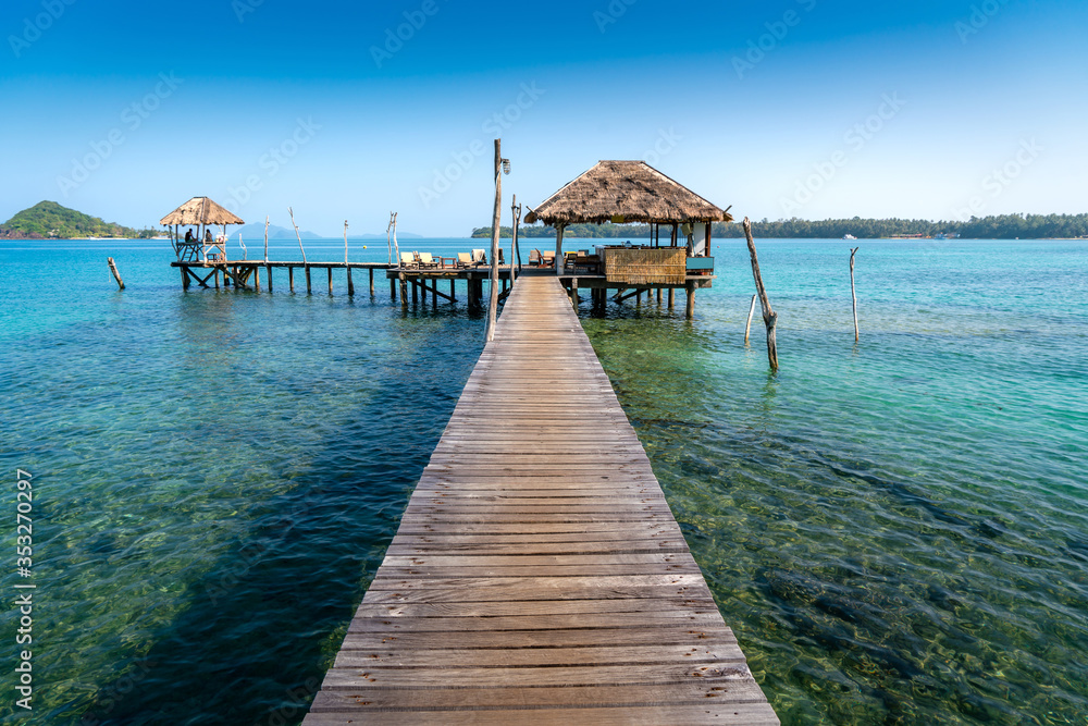 Wooden bar in sea and hut with clear day sky in Koh Mak at Trat, Thailand. Landscape and travel, or 