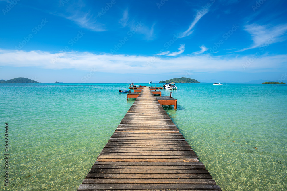 Wooden boat pier in sea and hut with clear day sky in Koh Mak at Trat, Thailand. Summer, Travel, Vac