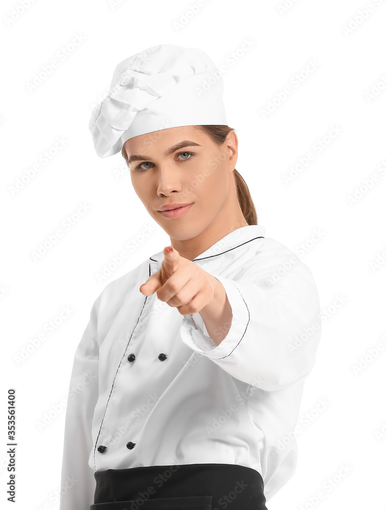 Transgender chef pointing at viewer on white background