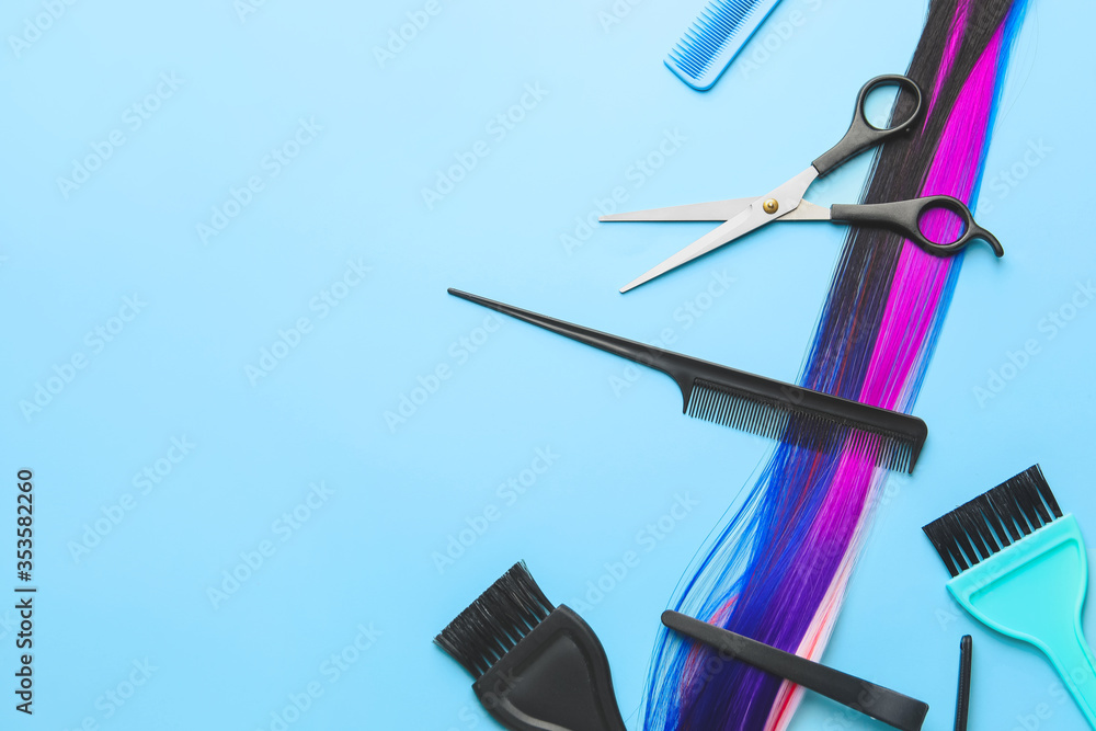 Hairdresser supplies on color background