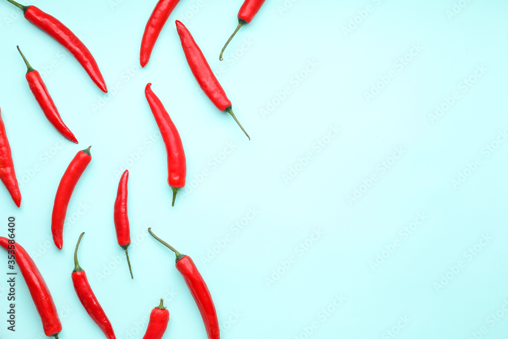 Hot chili pepper on color background