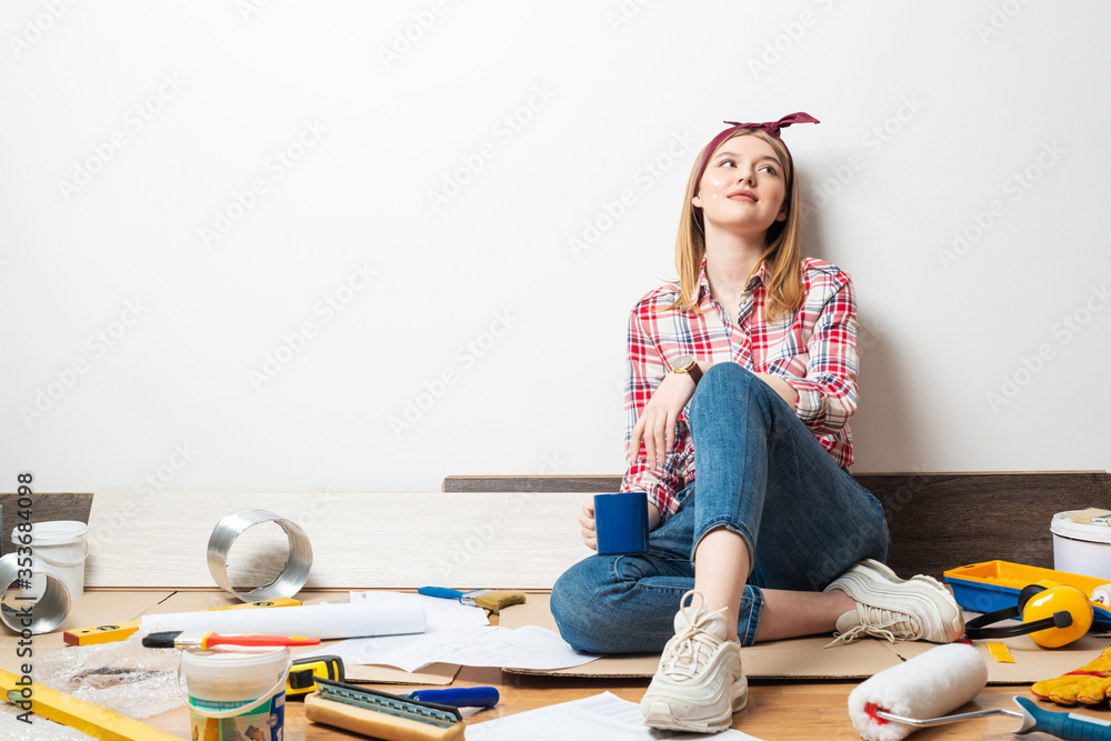 Smiling girl relaxing with coffee at home