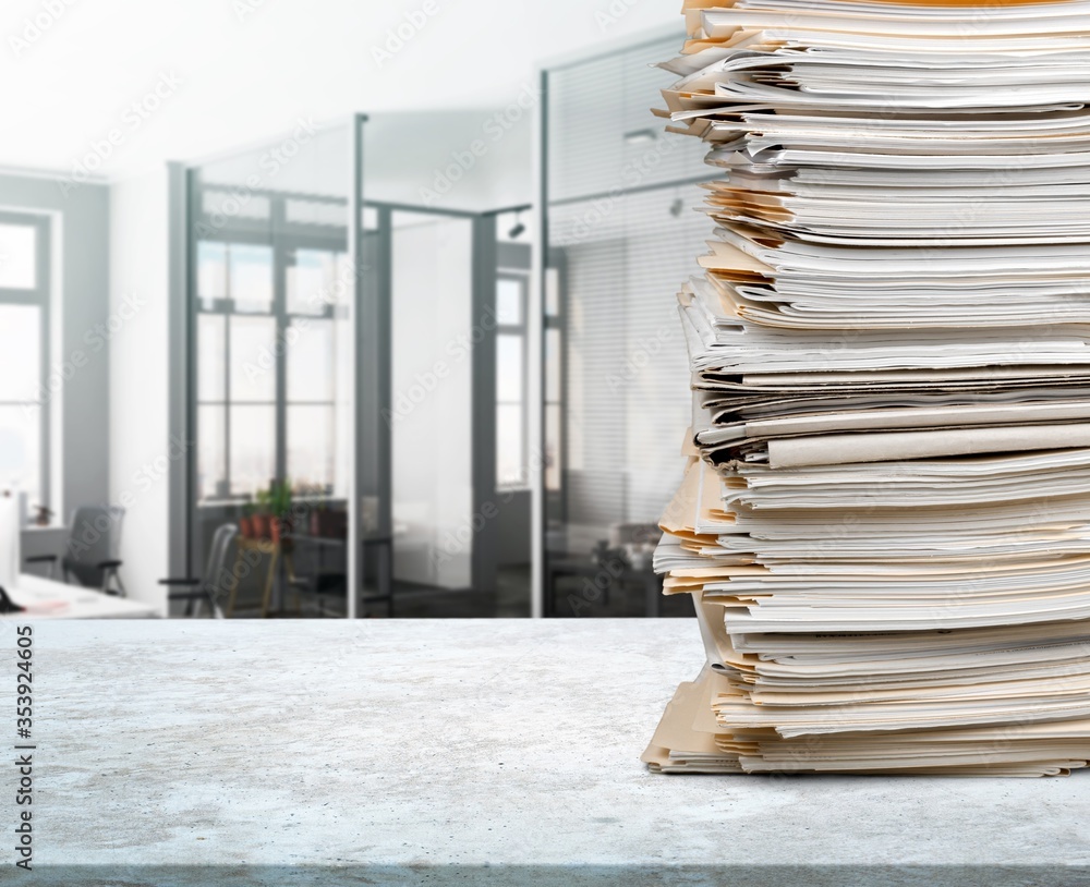 Stack of document papers on office background