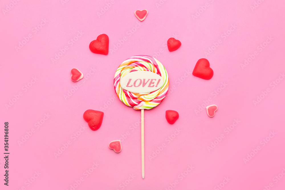 Sweet candies on color background