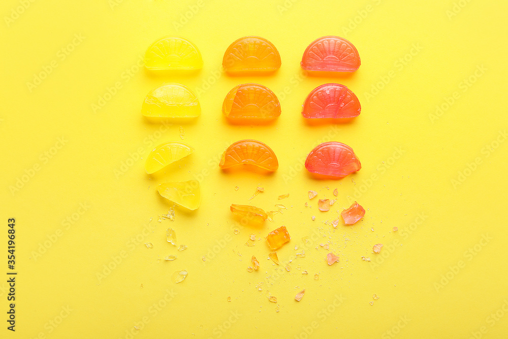 Sweet candies on color background