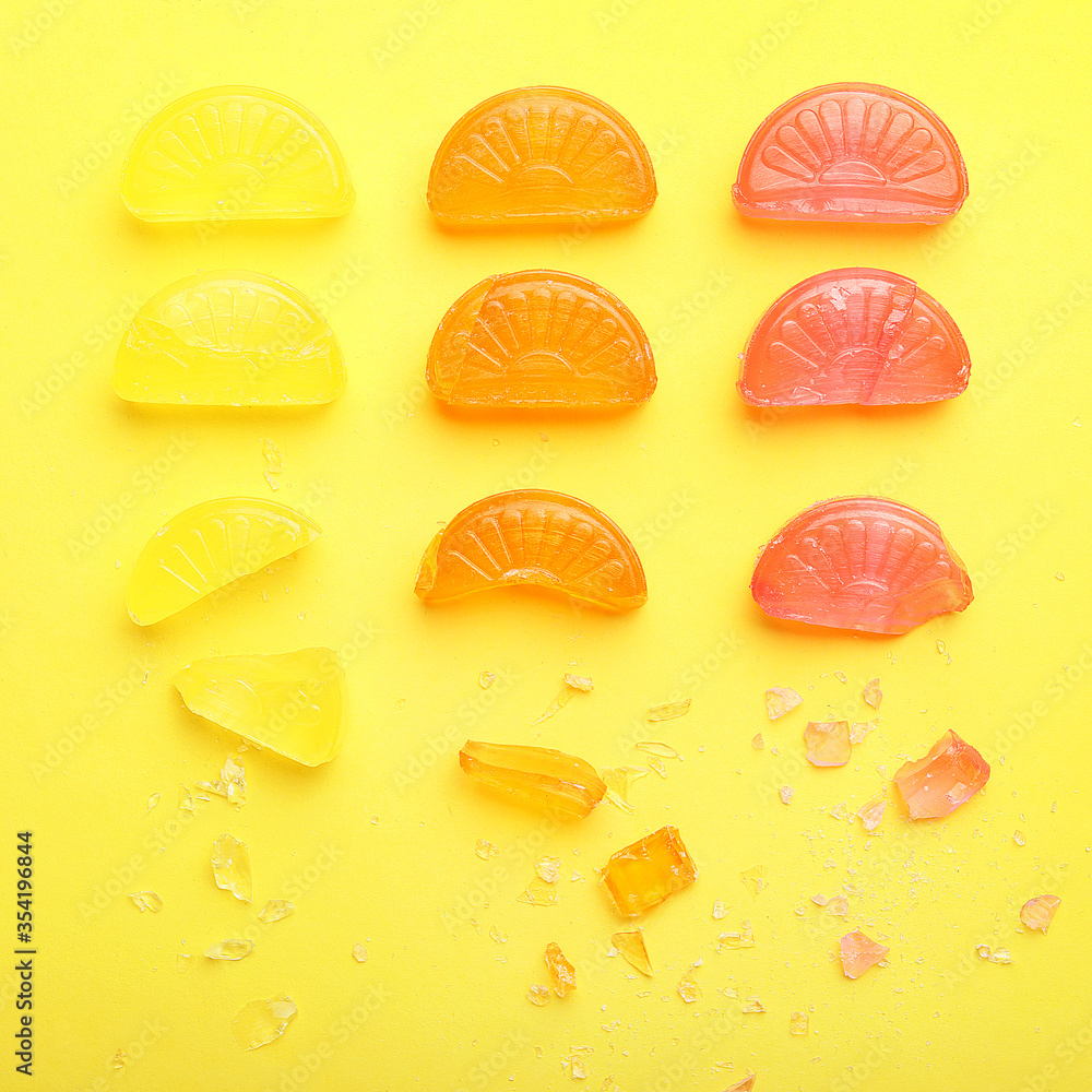 Sweet candies on color background