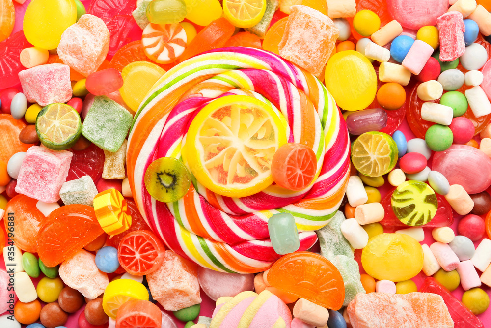 Assortment of sweet candies as background