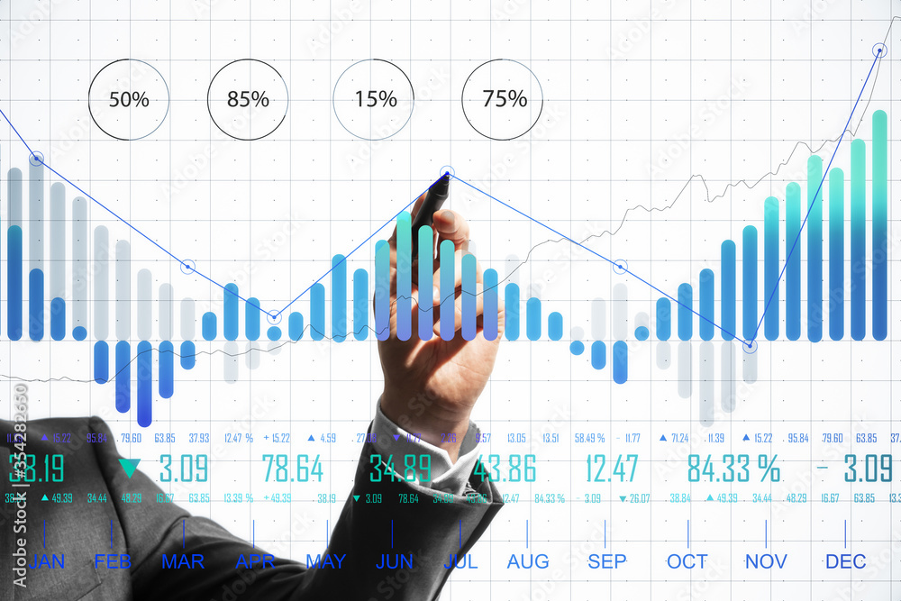 Businessman hand drawing business charts