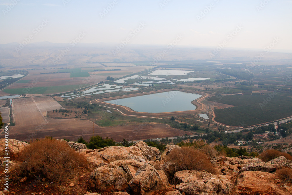 aerial view of a lake in a valley