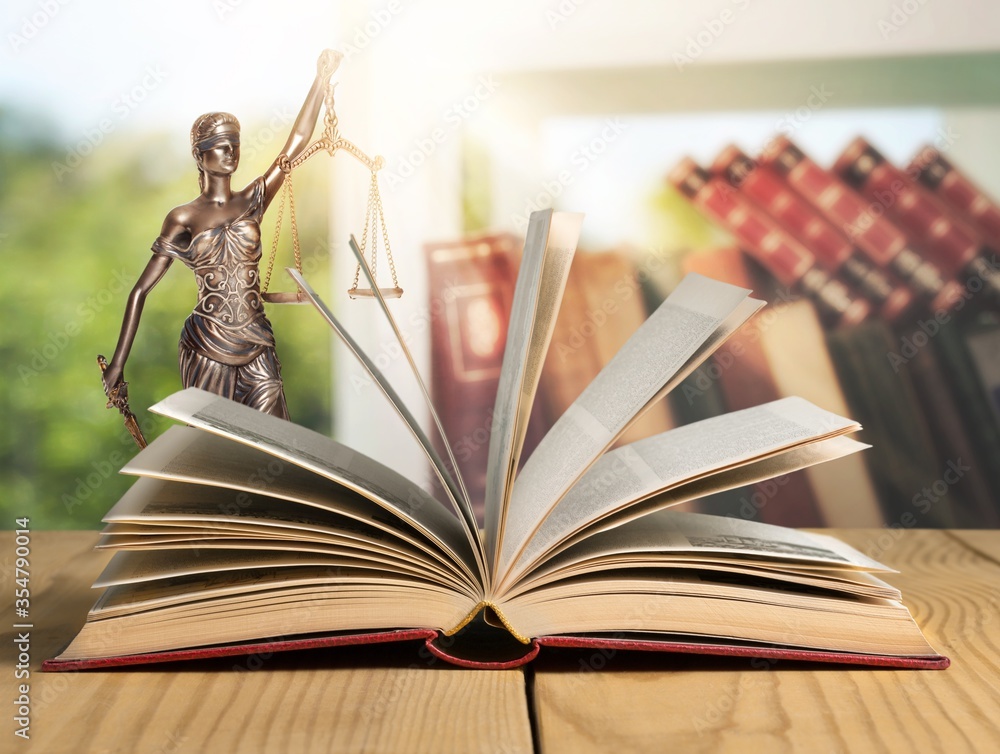 Open vintage book on wooden table