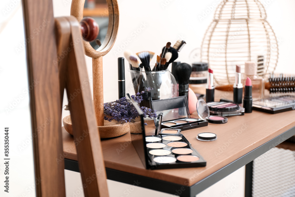 Set of decorative cosmetics on table