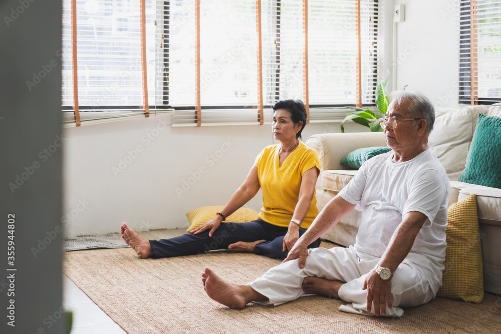 Asian old senior workout exercise and doing yoga at home