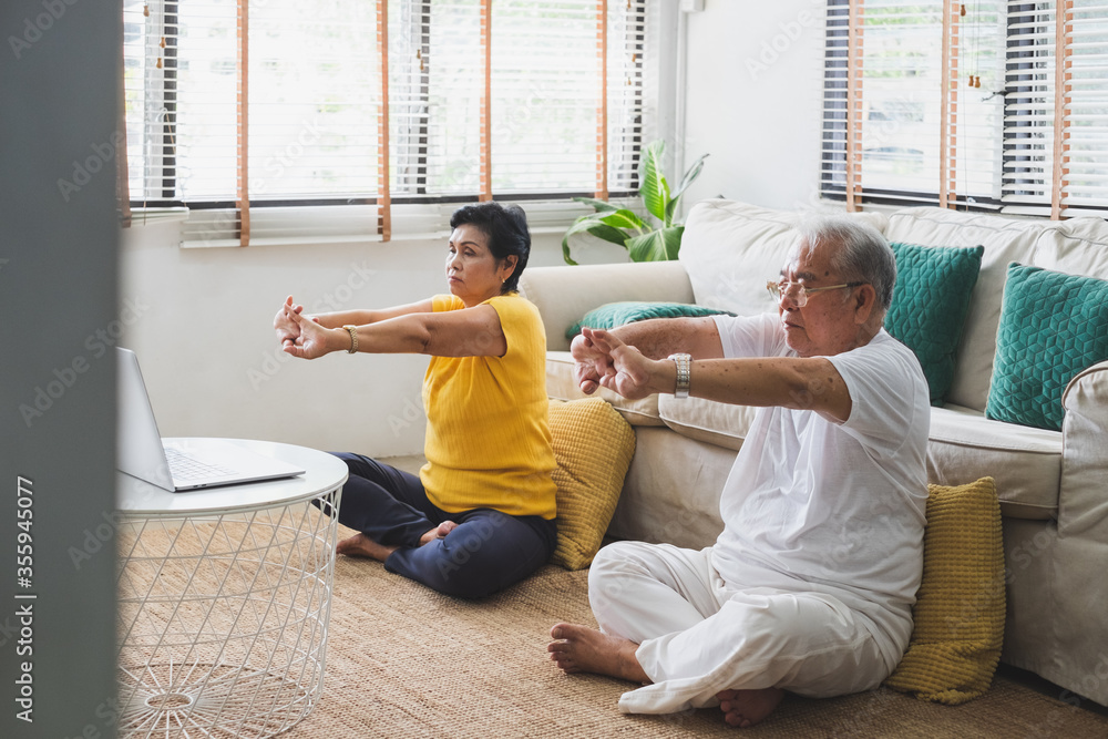 Asian old senior workout exercise and doing yoga at home