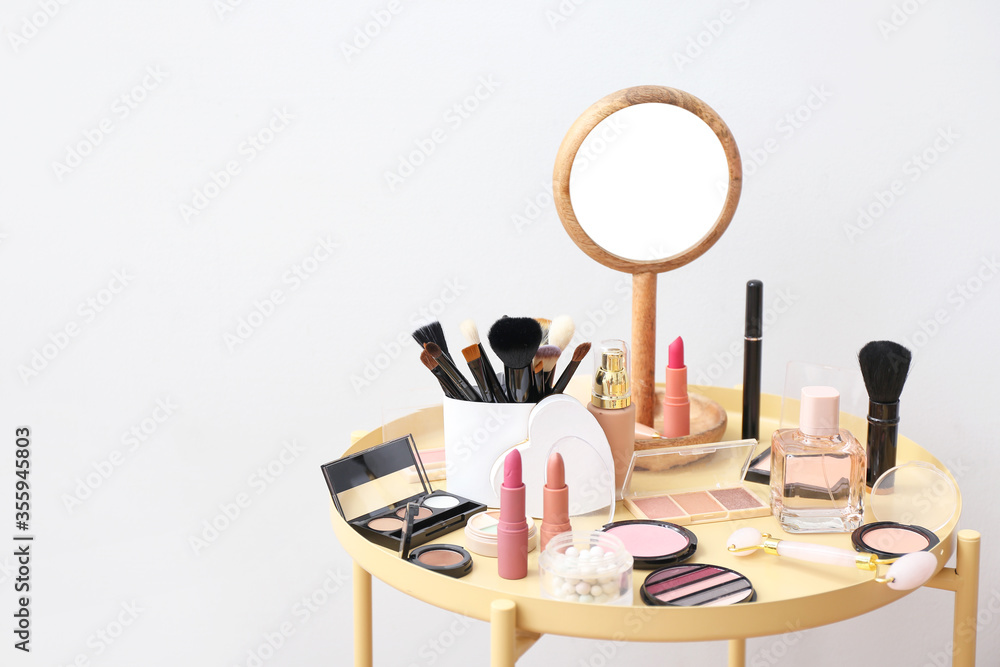 Set of decorative cosmetics on table