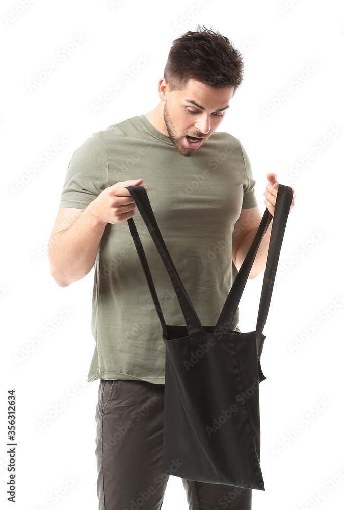 Young man with eco bag on white background