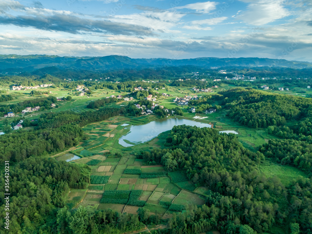 Rural countryside aerial view, green countryside and villages, Hunan, China。