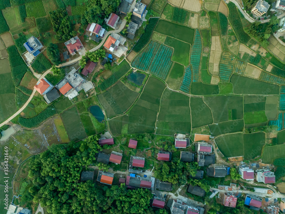 Rural countryside aerial view, green countryside and villages, Hunan, China。