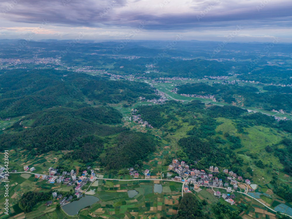 Rural countryside aerial view, green countryside and villages, Hunan, China。