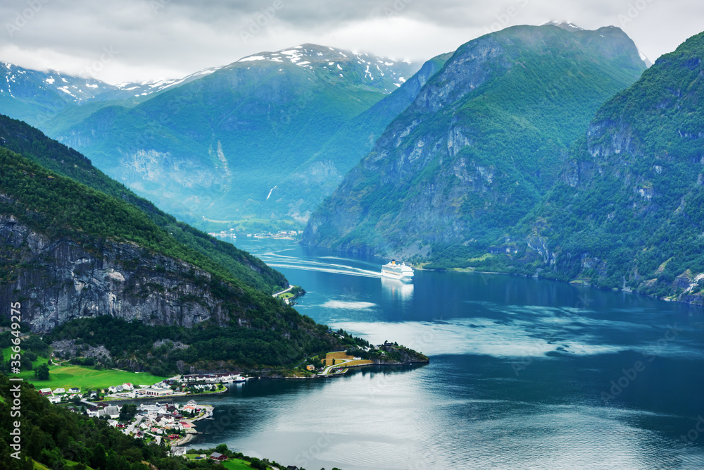 Breathtaking view of Sunnylvsfjorden fjord and cruise ship, near Geiranger village in western Norway