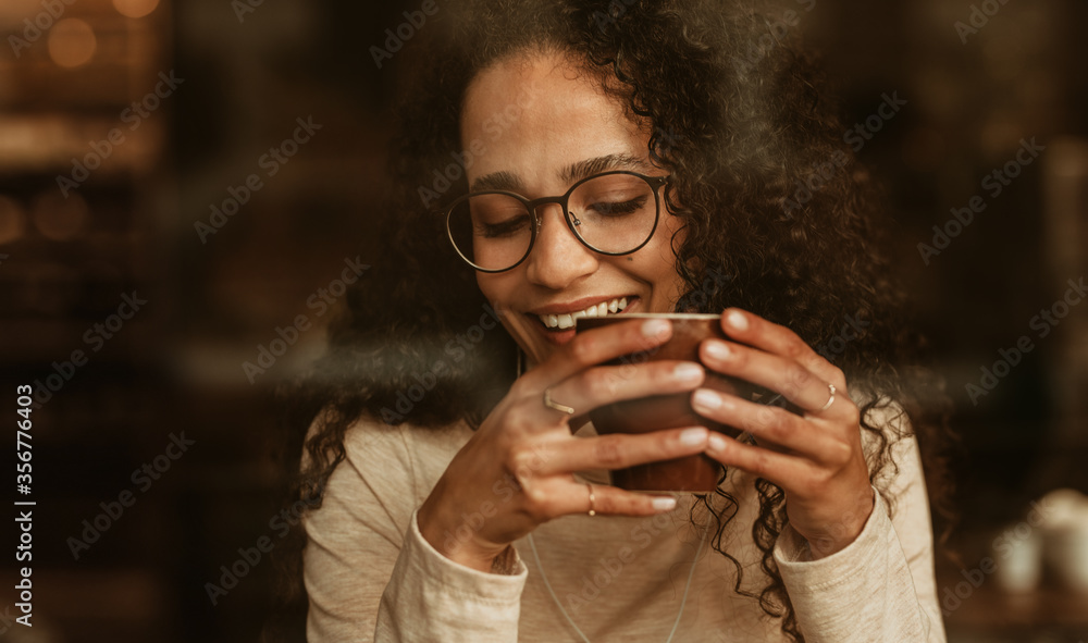 Woman having coffee at a cafe