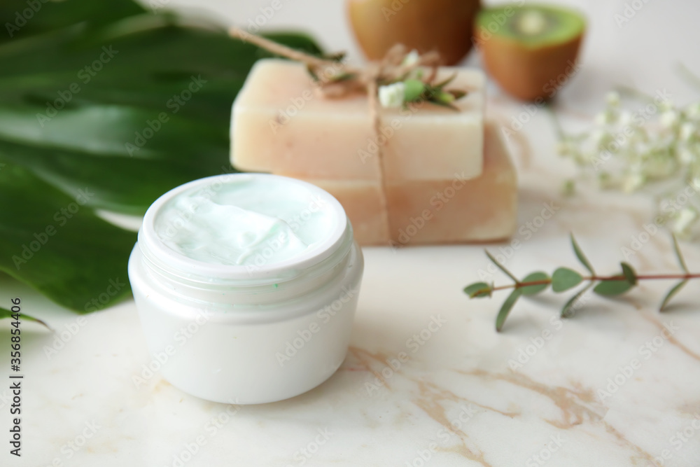 Jar of natural cream on table