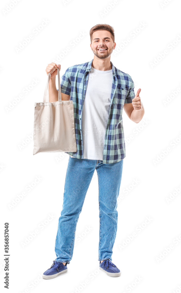 Young man with eco bag on white background