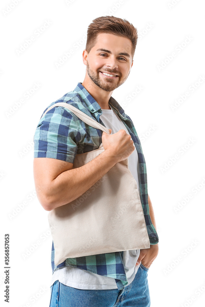 Young man with eco bag on white background