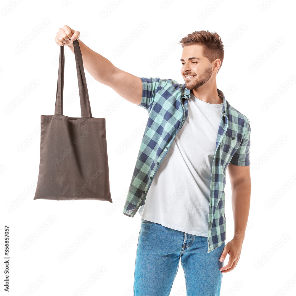 Young man with eco bag on white background