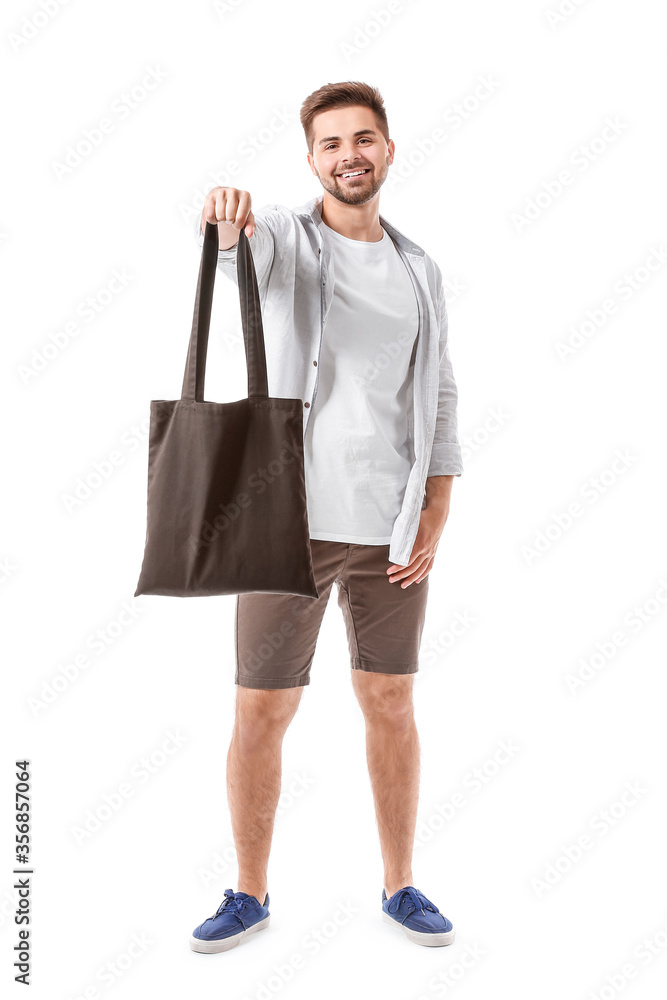 Young man with eco bag on white background