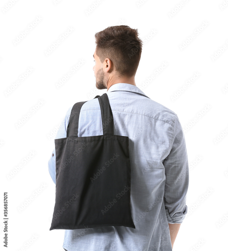 Young man with eco bag on white background