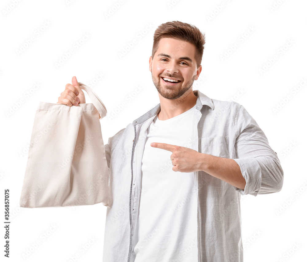 Young man with eco bag on white background