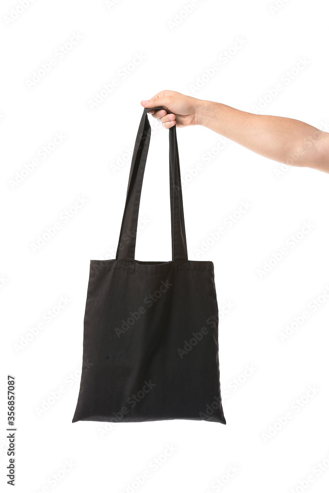 Male hand with eco bag on white background