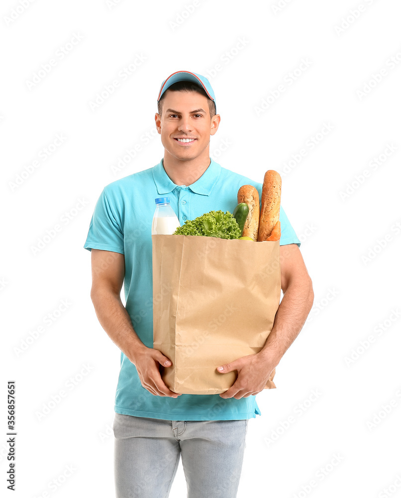 Delivery man with food in bag on white background