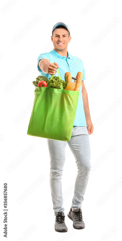 Delivery man with food in bag on white background