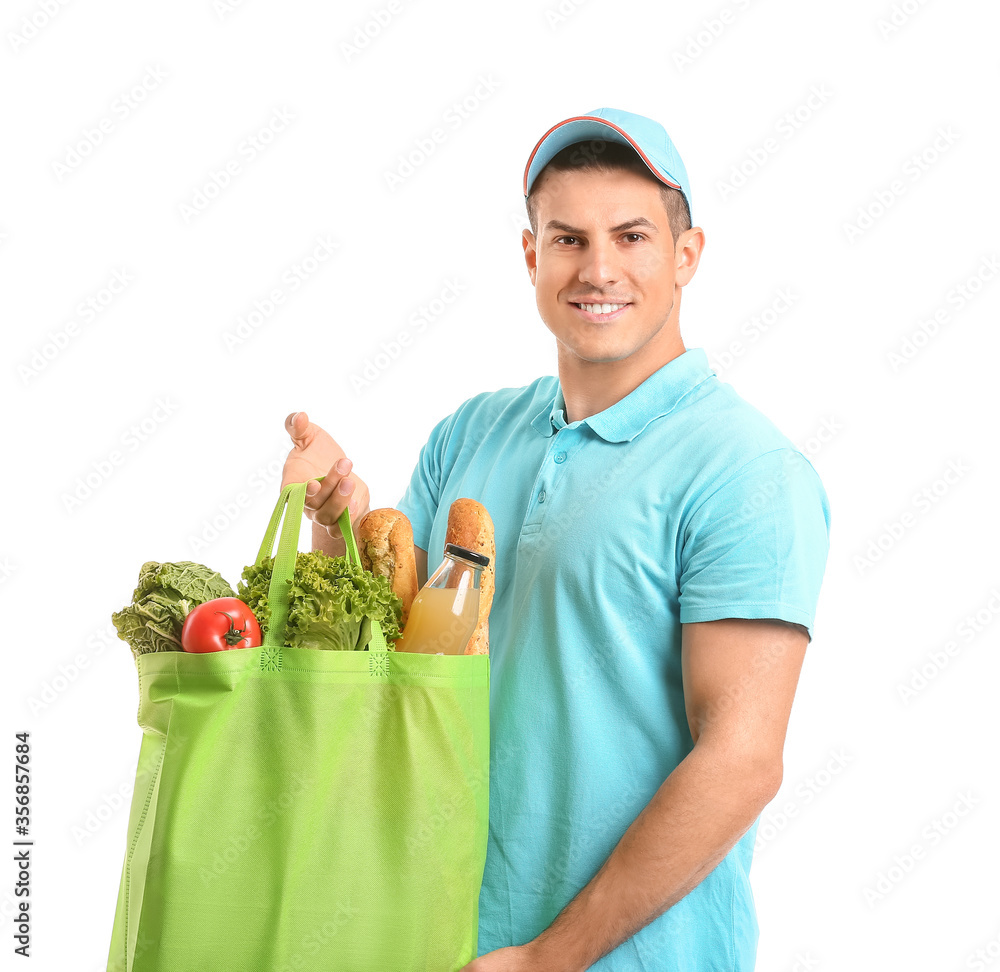 Delivery man with food in bag on white background