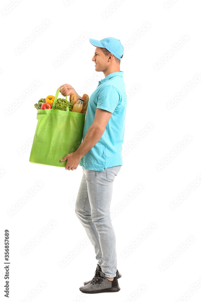 Delivery man with food in bag on white background