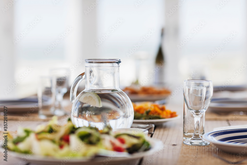 Food and water on set table